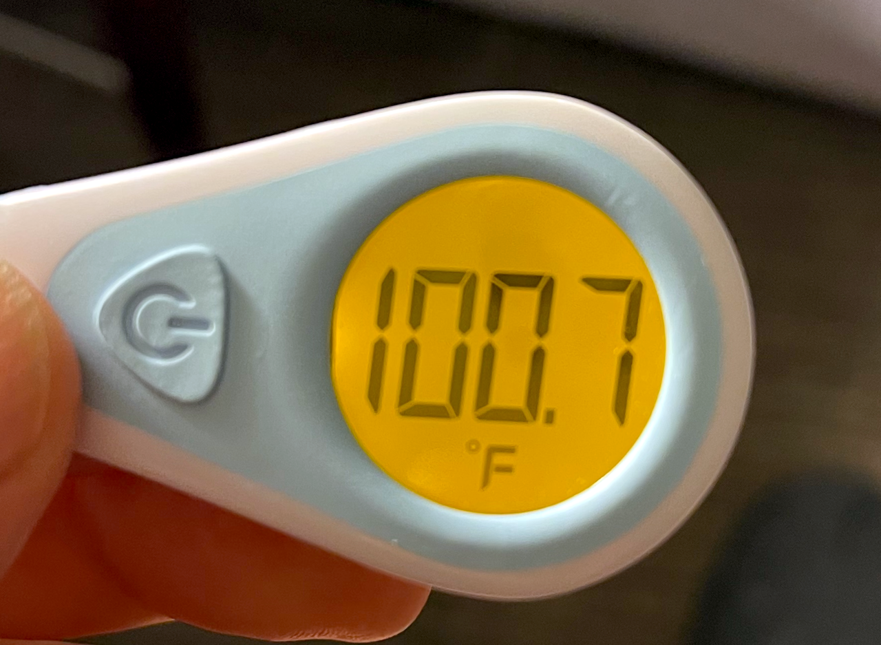 Thermometer showing a temperature of 100.7F