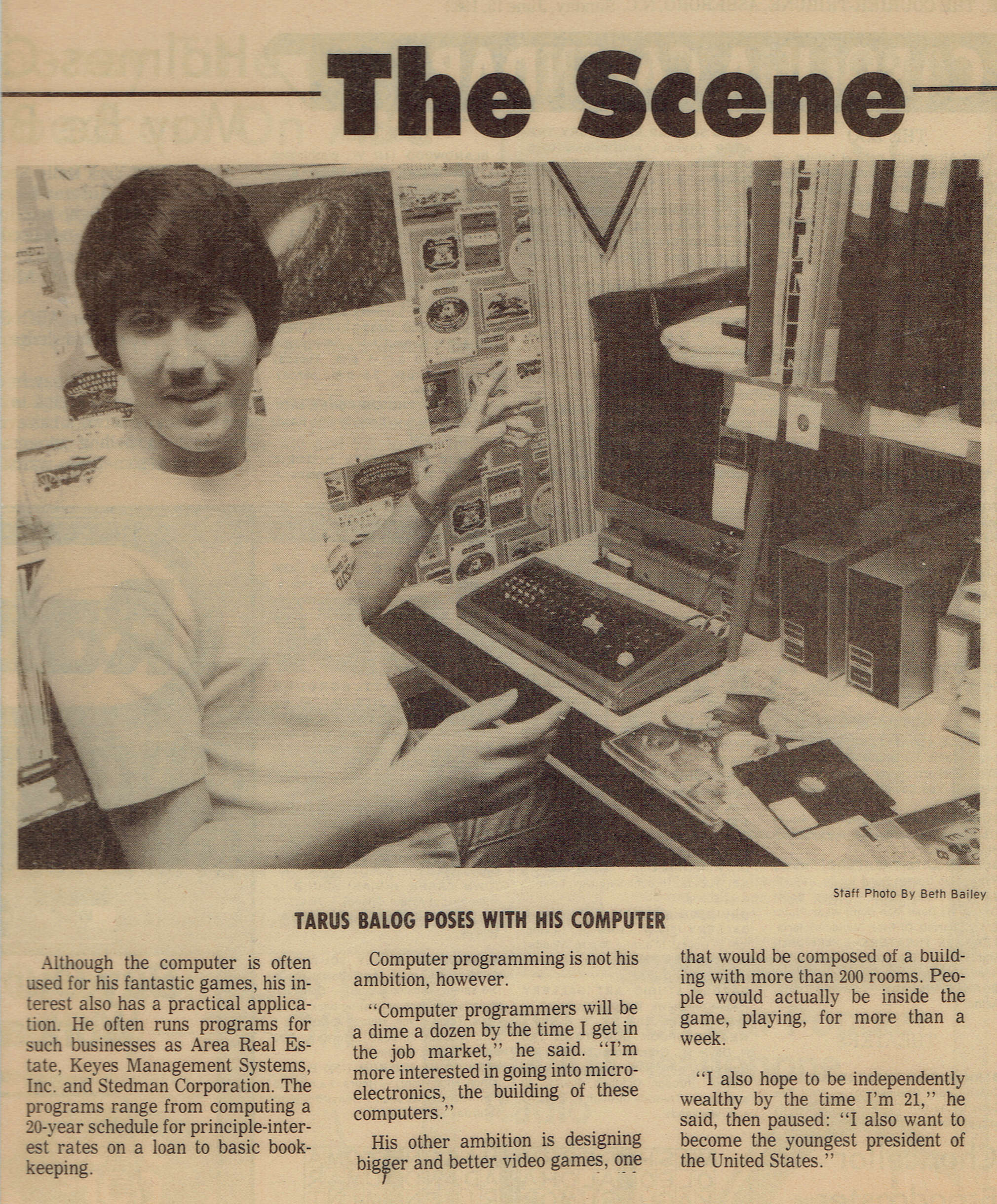 Me in front of a TRS-80 computer in an old newspaper clipping