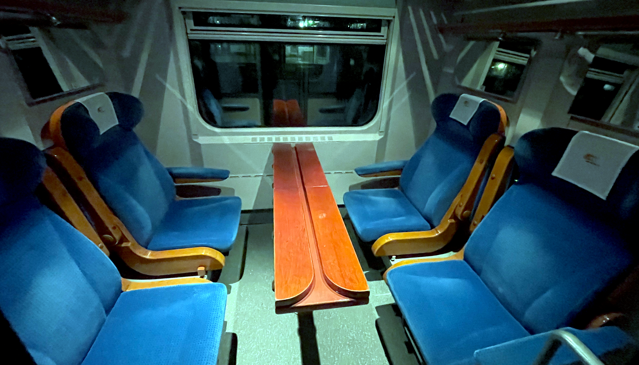 First class cabin showing four large seats