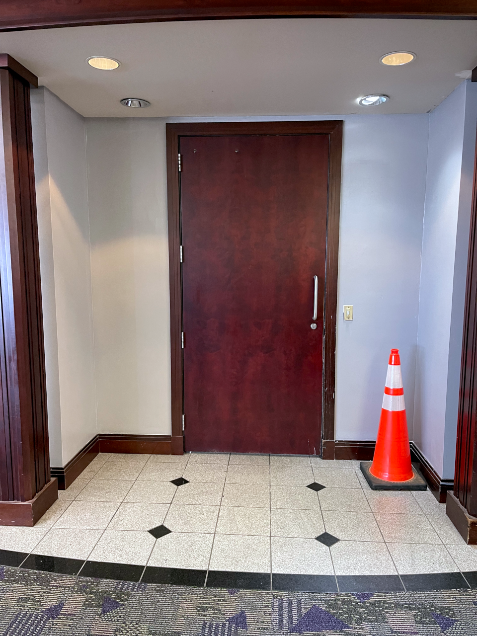 Unlabeled door to old Admiral’s Club Lounge