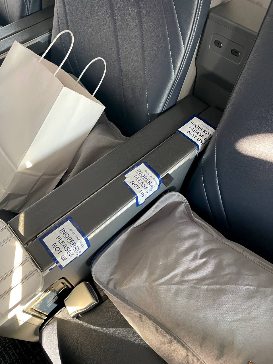 Seat with broken tray table